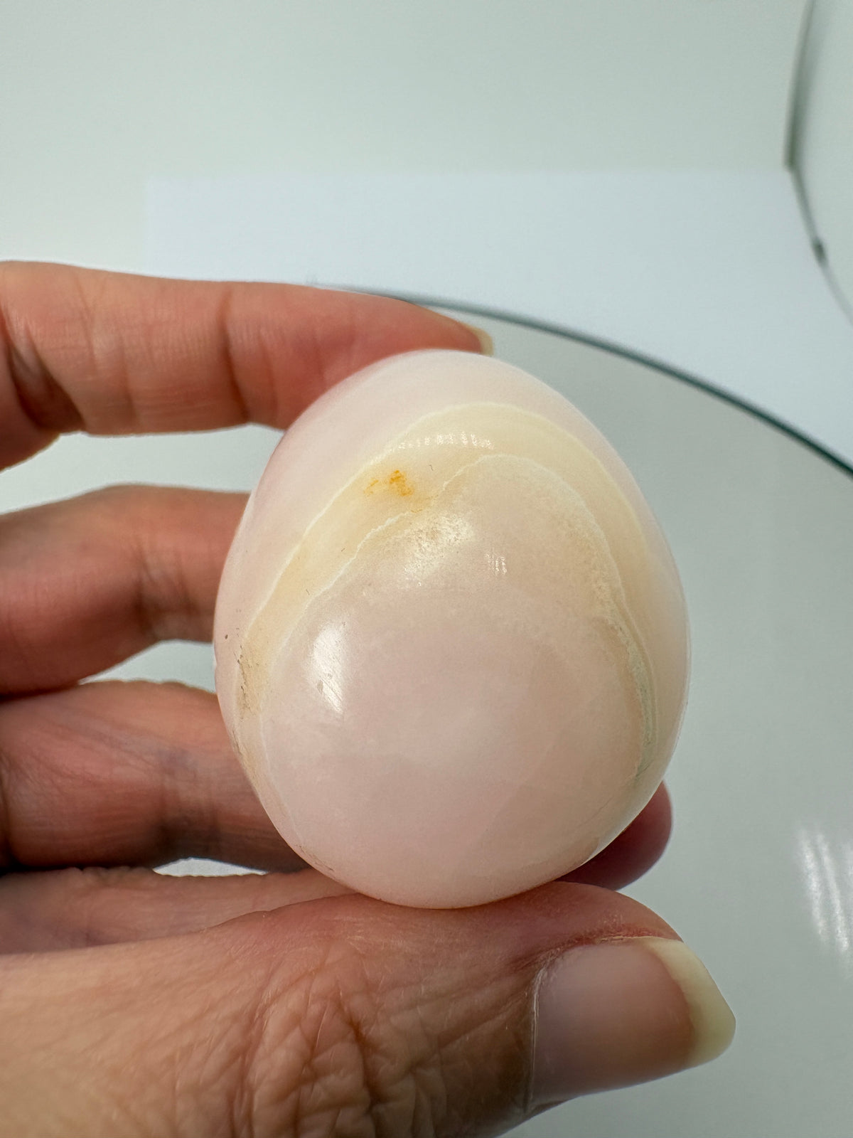 Huevo pequeño de manganocalcita pulido - foto 6