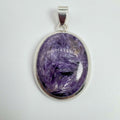 Colgante de charoita natural en plata de ley