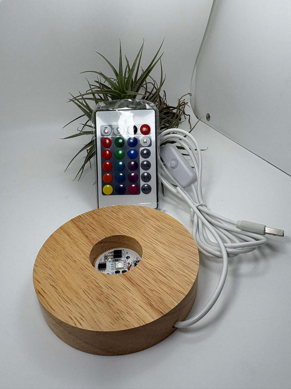 Base led de 10 cm con cambio de color y mando. compatibles con esferas de medianas a grandes o cualquier tamaño. 