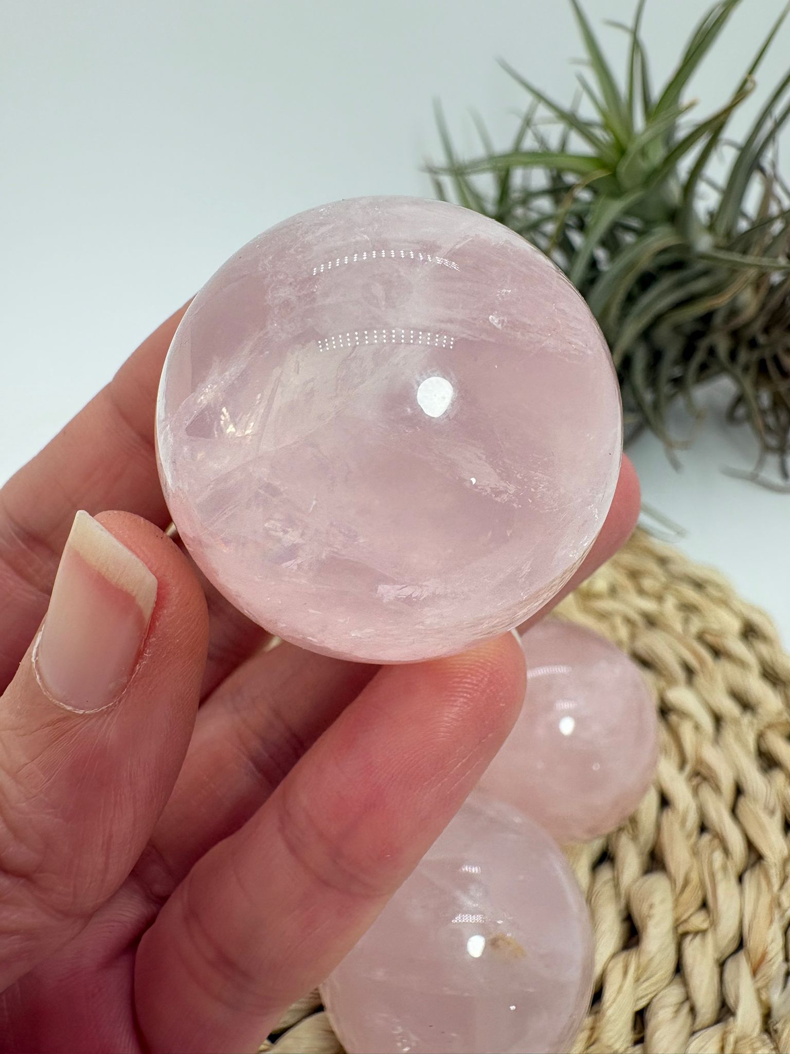 Esfera de cuarzo rosa cristalino pequeñas