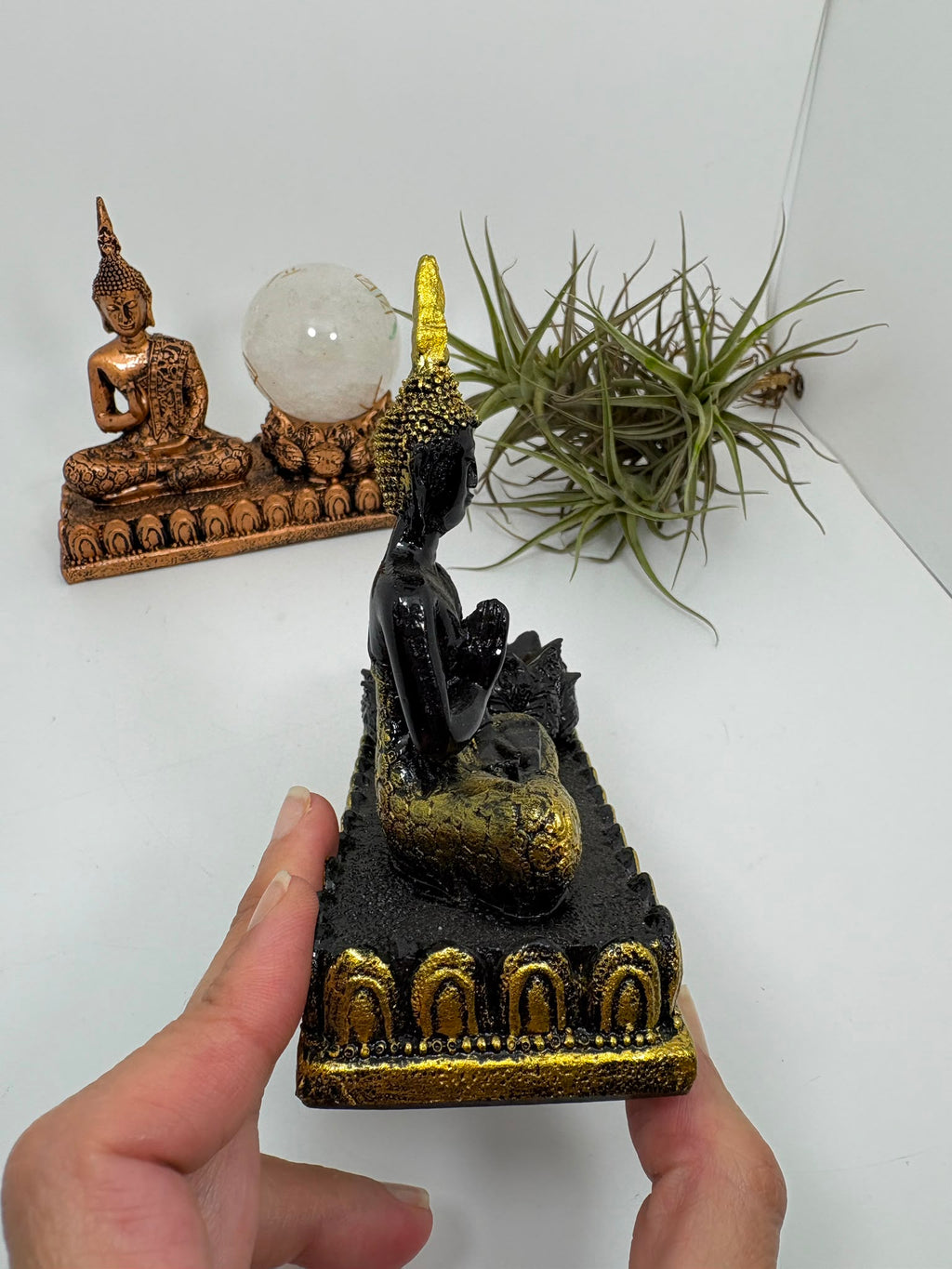 Porta esfera de Buda en resina